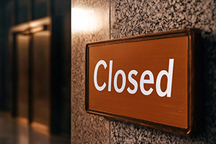 Closed sign for county holidays